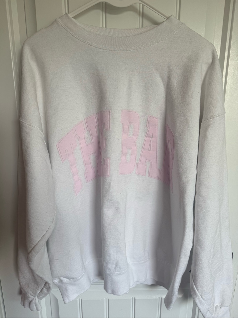 The Bar White Sweatshirt with Black Brand Tag